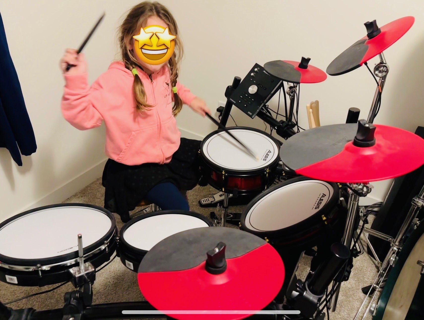 student playing drumset